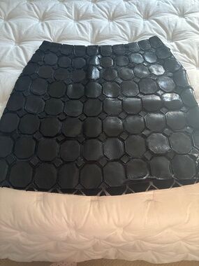 Patterned leather and silk mini skirt